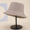 Elegant vertical striped bucket hat with rhinestones on a metal display stand - One Size / Brown