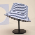 Classic blue and white striped bucket hat with rhinestones on a black display stand - One Size / Blue