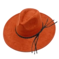 Close-up of bright orange fedora hat featuring black braided leather band with tassels - Caramel color