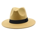 Close-up of camel fedora hat with black grosgrain ribbon and wide flat brim texture - One Size / Camel