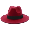 Detailed close-up of a red wool fedora hat featuring a classic black decorative ribbon band - One Size / Burgundy