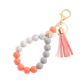 Detail view of silicone beads and leather tassel on the beaded wristlet keychain - Orange Pink (43769-BC1005)