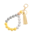 Detail of beaded keychain with yellow and marble silicone beads, wood bead and tassel - Lemon Yellow (43769-BC1505)