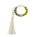Close-up of silicone beaded keychain with white tassel and engraved wooden hex bead - Matcha Green Terrazzo