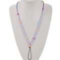Detail of handmade colorful heart beaded phone lanyard on a grey mannequin bust display - Purple