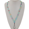 Detail of handmade beaded phone strap with green seed beads and colorful heart charms - Green
