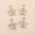 Close-up of four gold star alloy pendants with rainbow AB rhinestones for DIY jewelry - Colorful Pentagram