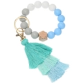 Detail of silicone beaded wristlet with gradient tassel, wood bead and golden lobster clasp - Blue