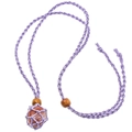 Detailed close-up of handmade purple woven net pouch holding a polished red stone pendant - Purple Net Pocket Necklace / Purple