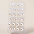 Set of 12 pairs of minimalist white pearl stud earrings with gold claw settings in various sizes - Mixed Size Pearl Flower Style