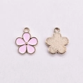 Detail of pink enamel flower charms with gold metal edges and hanging loops for DIY jewelry - Round Edge Five Petal Flower / Pink
