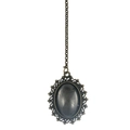 Detail of vintage oval pendant with grey marble resin stone and antique bronze frame - Gun Black Resin Lid Photo Frame Pendant