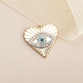 Macro de pendentif cœur en alliage doré avec œil protecteur et détails en zircon blanc - Yeux en forme de cœur doré avec strass