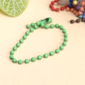 Detailed close-up of green painted metal bead chain with matching connector clasp - Light Green