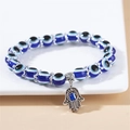 Bracelet en résine Evil Eye bleu avec pendentif main de Hamsa argenté et séparateurs - Main de Fatma Bleue