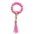 Close-up of pink silicone beaded wristlet keychain with XO pattern and leather tassel - OXOX Rose Red Beaded Tassel Keychain