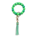 Detail of green silicone bead wristlet keychain with gold clasp and leather tassel - OXOX Green Beaded Tassel Keychain