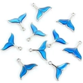 Macro shot of 10 gradient blue mermaid tail charms with silver-tone alloy frames - Silver Blue Fish Tail Style (167116-B3-2501)