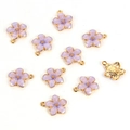 Close-up of lilac enamel flower charms with gold plating and honeycomb textured back - Flower / Purple