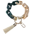 Detailed view of green marble resin chain keychain with a beige faux leather tassel - Dark Green And Cream