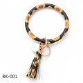 Detail of sunflower printed PU leather wristlet keychain with gold hook and matching tassel - Sunflower (BK-001)