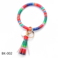 Detail showing colorful striped PU leather wristlet keychain with fringe tassel and gold clasp - Multicolor Stripes (BK-002)
