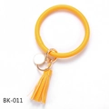 Close-up of yellow PU leather bracelet keychain with gold ring, tassel and blank pendant - Bright Yellow (BK-011)