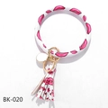 Detail of PU leather keychain bracelet with red lip pattern, tassel, and gold metal hardware - Lip Pattern (BK-020)