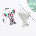 Detailed size view of sugar skull chihuahua metal pendant with colorful enamel drips - Rainbow Dog