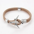 Détail du bracelet en paracorde marron avec fermoir en forme d'avion argenté poli - Avion Argenté Corde Kaki