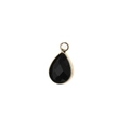 Détail d'un pendentif en cristal noir facetté en forme de larme avec bordure dorée - Noir