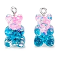 Macro detail of glittery resin gummy bear charms with pink and blue gradient - Pink and Blue Gradient Glitter