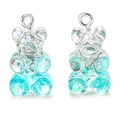 Macro shot of two transparent blue glitter resin bear pendants with silver hooks for DIY jewelry - White and Blue Gradient Glitter