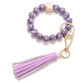 Llavero pulsera de cuentas moradas con diseño floral, cuenta de madera y borla de cuero - Púrpura