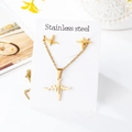 Detail view of gold stainless steel necklace and earring set with heartbeat pattern - Heartbeat Waveform