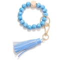 Llavero de pulsera con cuentas azul claro decoradas, cuenta de madera y borla azul - Azul