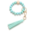 Patterned wood bead bracelet keychain with light blue floral beads and leather tassel - Sky Blue