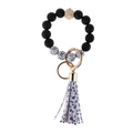 Black beaded keychain bracelet with cow print wooden bead and leather tassel charm - Number Print Black Wood Bead Bracelet Keychain
