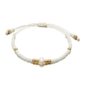 Close-up of handmade beaded bracelet with freshwater pearl and adjustable white cord - Pure White