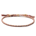 Detail of bohemian hand-woven friendship bracelet with pink cords and gold metal beads - Pink Gray Beige Gold Braided (Color 2)