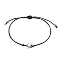Detailed macro view of adjustable black braided rope bracelet with silver star charm - Five-pointed Star