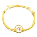 Close-up of bright yellow woven rope bracelet with gold sea wave metal pendant - Bright Yellow