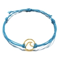 Handmade sky blue braided wave bracelet with a golden ocean pendant and adjustable cord - Sky Blue