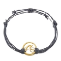 Macro detail of handmade grey braided rope bracelet with golden surf wave charm - Gray