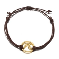 Detail of adjustable dark brown braided bracelet with a golden wave circular pendant - Dark Brown