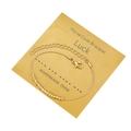 Golden Morse code luck bracelet on a display card with adjustable lobster clasp - Luck Theme