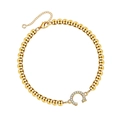 Gouden kralenarmband met een hoefijzer hanger voorzien van schitterende kristallen - Letter C