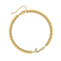 Golden beaded bracelet with a sparkling crystal-encrusted letter J pendant and lobster clasp - Letter J