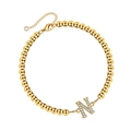 Gold beaded bracelet featuring a crystal-encrusted letter N pendant with lobster clasp - Letter N