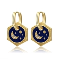 Detail of gold celestial earrings with blue enamel, star and moon charms - Earrings